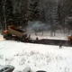Illustration for article titled Why do Russians pour asphalt over snowed roads instead of plowing them?